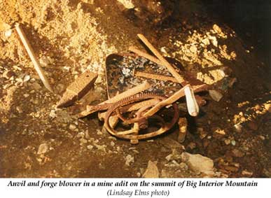 Anvil and forge blower in a  mine adit on the summit of Big Interior Mountain